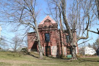 Notice the redstone architecture of the Beacon Free Library.  This Library has many rare books including original John Elliot Bible.  Near The South Natick Dam. Natick April 2008, MA 