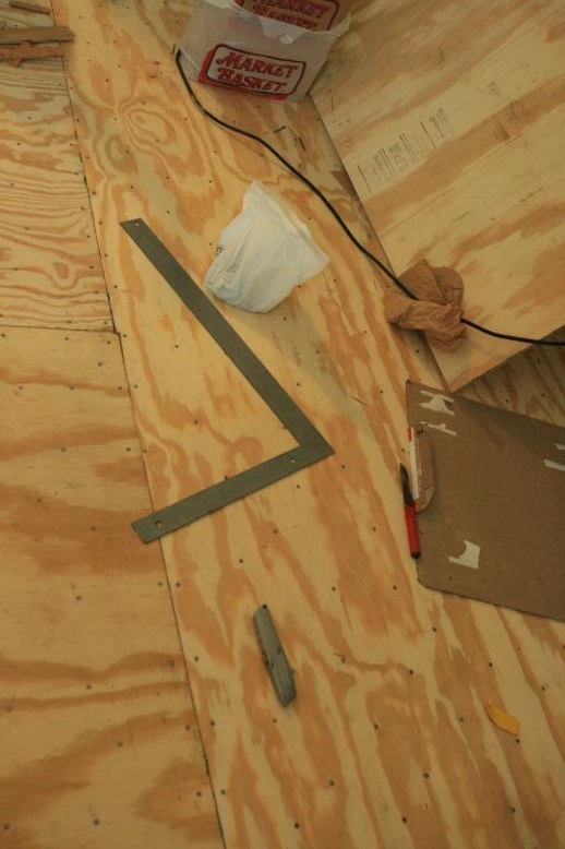 The new floor and a T-square.