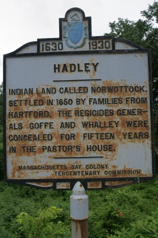 Sign on Rt 9, on the Hadley line with North Hampton: . Natick backyard, MA June 2009.