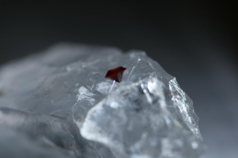 tiny ruby on a quartz or topaz crystal, Lebanon, NH.